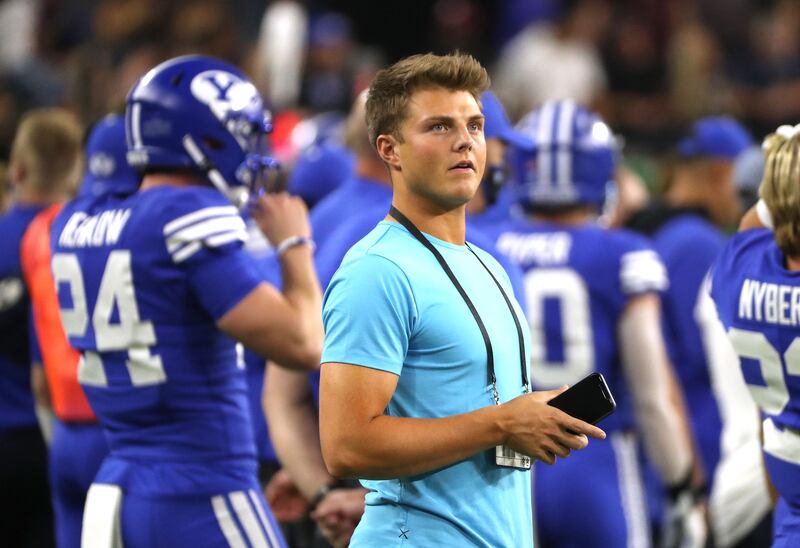 Former BYU quarterback Zach Wilson attends the game during the Vegas Kickoff Classic.