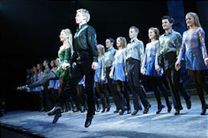 Dancer Anthony Sharkey, center, steps lively during a show with the rest of the "Riverdance" performers.