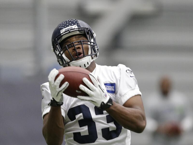 Former Utah State safety Marwin Evans catches a ball during a Seattle Seahawks rookie minicamp workout Sunday, May 8, 2016, in Renton, Wash. After a tryout with the Seahawks, Evans signed with the Green Bay Packers on Monday, May 9, 2016.