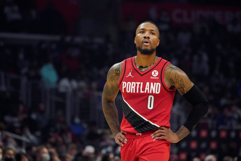 Portland Trail Blazers guard Damian Lillard walks on the court for a game against the Los Angeles Clippers, Oct. 25, 2021.