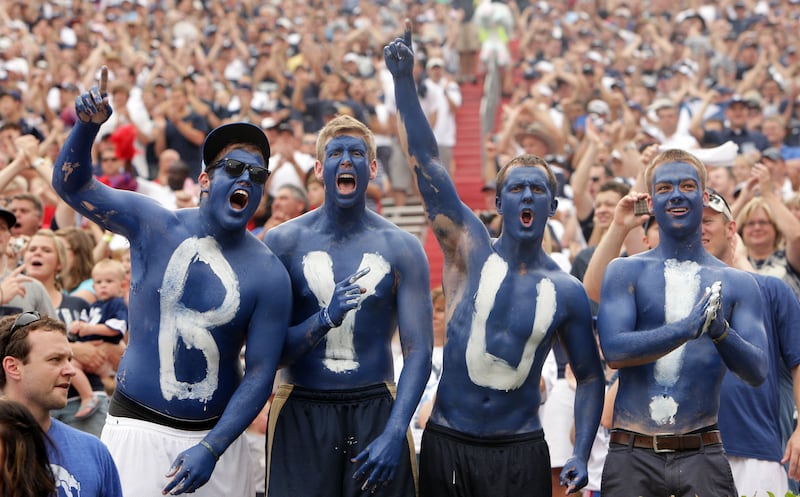 BYU fans cheers on the team during the Cougar season opener with Ole Miss in Oxford, Miss Saturday, Sept. 3, 2011.