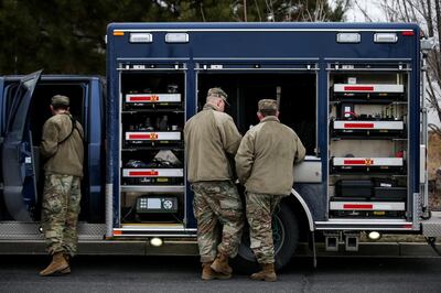 Members of the Utah National Guard's 85th Civil Support Team assist in ferreting out the source of fumes that mad residents sick and displaced at least two families in Layton on Wednesday, Feb. 27, 2019.