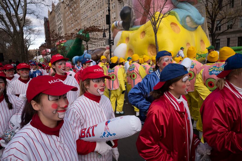 Balloon handlers and costumed characters gather before the Macy’s Thanksgiving Day Parade, Thursday, Nov. 28, 2019, in New York.