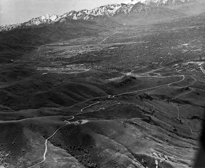 Aeriall view of Ensign Peak and the city looking south in September 1959. Church President Brigham Young and several other leaders hiked to the peaks summit on July 26, 1847. Young remarked that it "was a proper place to raise an ensign to the nations" so