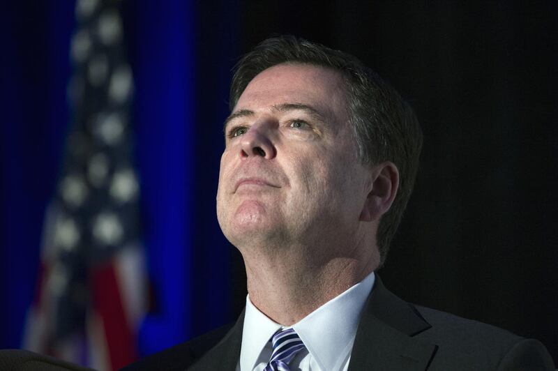FILE "” In this March 29, 2017 file photo, FBI Director James Comey addresses the Intelligence and National Security Alliance Leadership Dinner in Alexandria, Va. Comey cut an unorthodox path as head of the FBI, time and again compelled by strongly held c