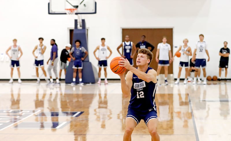 Utah State junior guard Mason Falslev pulls up to shoot a 3-pointer during the Aggies’ practice Tuesday morning at the Wayne Estes Center in Logan.