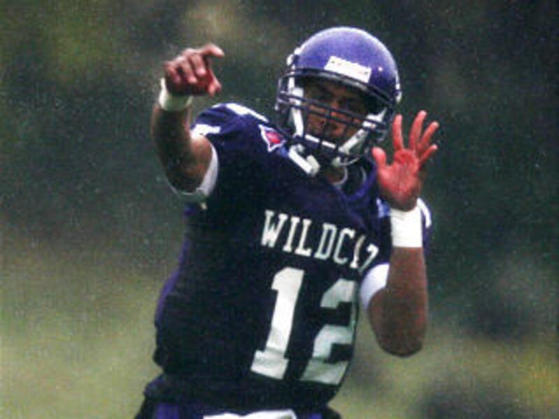 Weber State quarterback Cameron Higgins throws a pass during the Wildcats' 45-28 defeat of Montana.