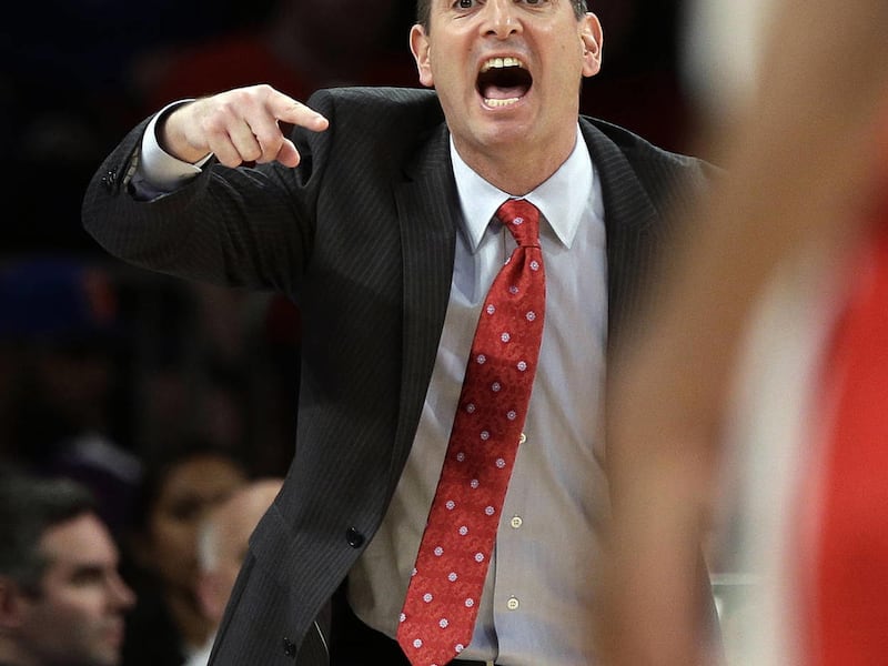 FILE - In this March 12, 2013, file photo, Rutgers coach Mike Rice yells out to his team during an NCAA college basketball game against DePaul at the Big East tournament in New York. The videotape, broadcast Tuesday, April 2, on ESPN, prompted scores of o