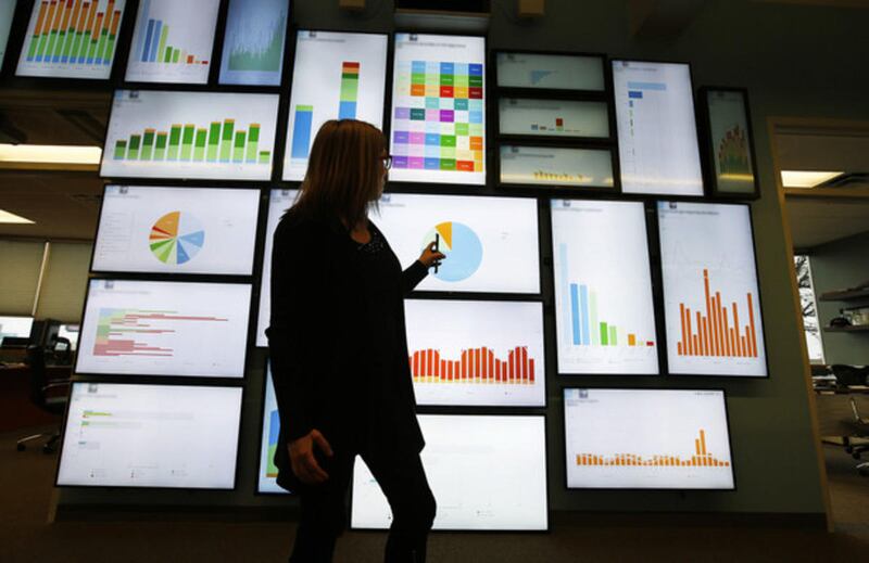 Julie Kehoe, vice president of communications at Domo Technologies, looks over information on the wall board in American Fork on Wednesday, March 30, 2016. (Photo: Jeffrey D. Allred, Deseret News)