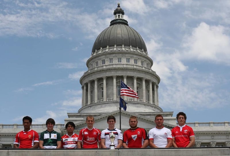 Players from the Junior World Rugby Trophy tournament stand on the steps of the Utah State Capitol.