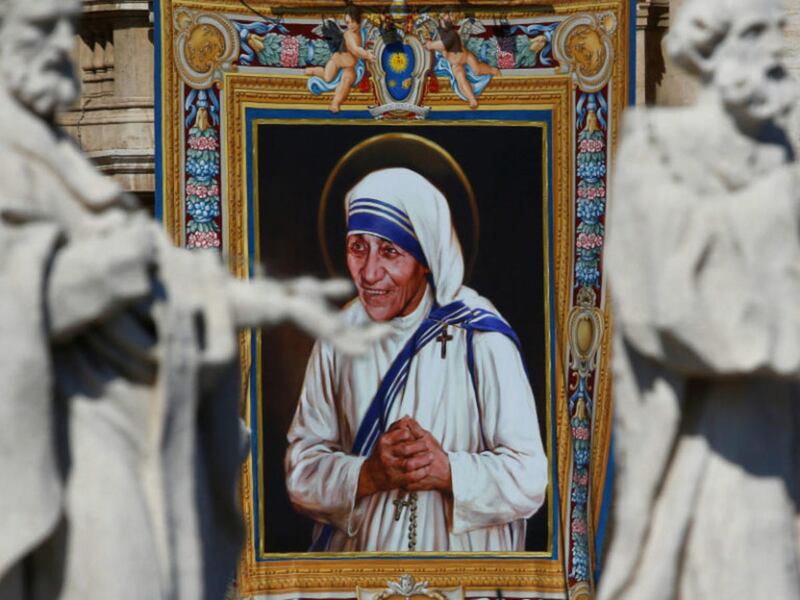 A tapestry depicting Mother Teresa of Calcutta is seen in the facade of Saint Peter's Basilica during a Mass, celebrated by Pope Francis, for her canonization in Saint Peter's Square at the Vatican on September 4, 2016.