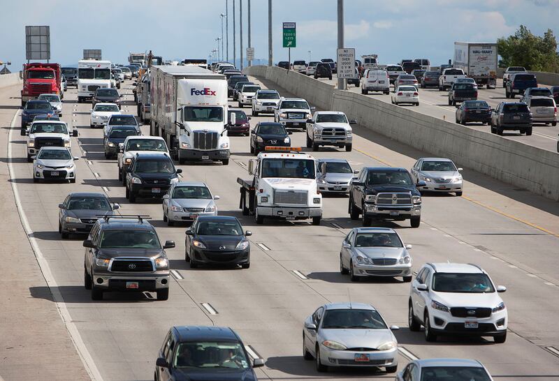 FILE - Rush hour traffic moves northbound on I-15 at 5100 South in Salt Lake City, Thursday, May, 26, 2016.