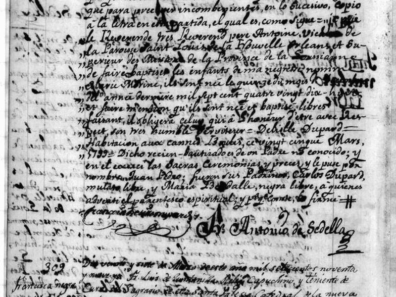 This undated photo released Tuesday, Feb. 1, 2011, by the Office of Archives of the Archdiocese of New Orleans, shows a 1799 record of baptism, written in Spanish and French. Sacramental records that date back before Louisiana's statehood of April 30, 181
