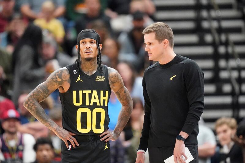 Utah Jazz guard Jordan Clarkson speaks with head coach Will Hardy during game against the Los Angeles Lakers Monday.