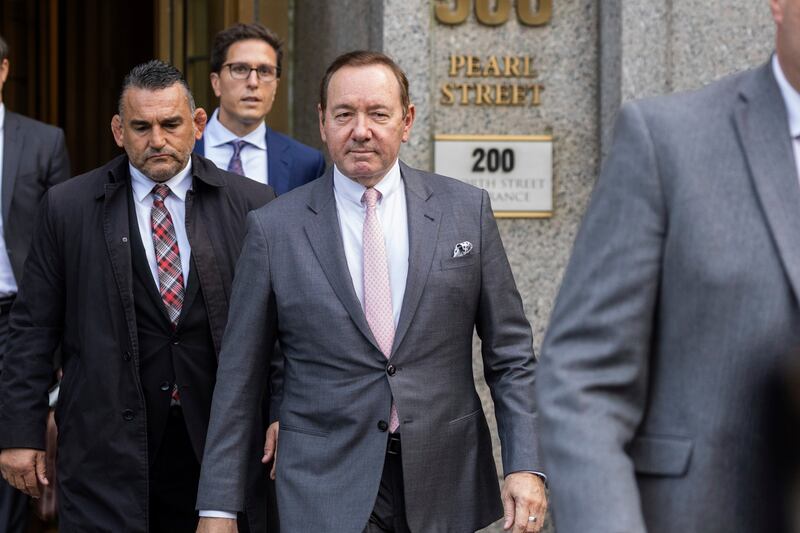 Actor Kevin Spacey leaves court in New York.