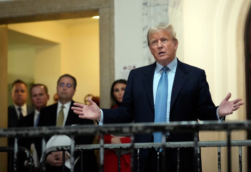 Former President Donald Trump speaks outside of his civil business fraud trial at New York Supreme Court on Oct. 18, 2023.