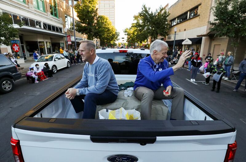 BYU athletic director Tom Holmoe and President Kevin Worthen participate in Baylor’s homecoming parade on Oct. 12, 2021.