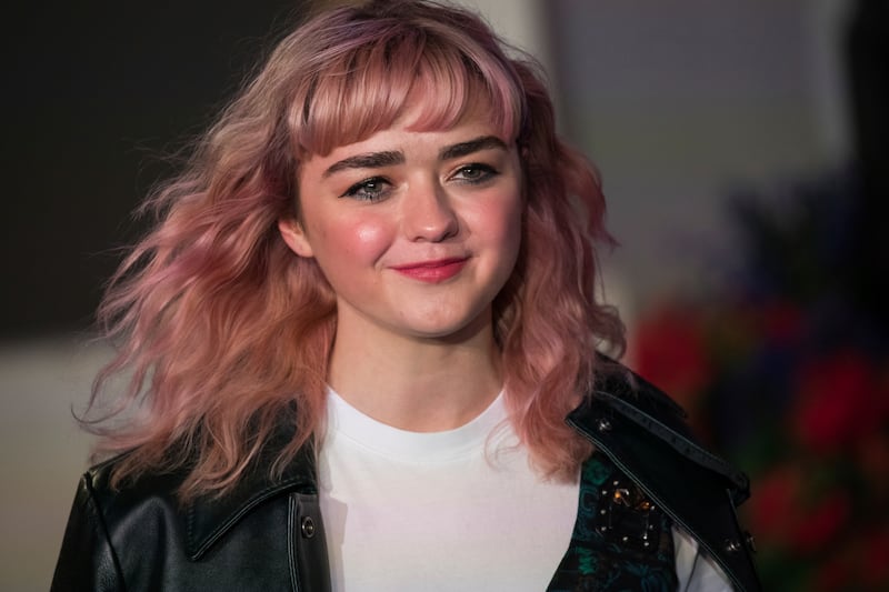 Actress Maisie Williams poses for photographers upon arrival at the "Mary Poppins Returns" premiere in London, Wednesday, Dec. 12, 2018. Williams, a "Game of Thrones" star, recently spoke about her struggles with mental health from her celebrity status.