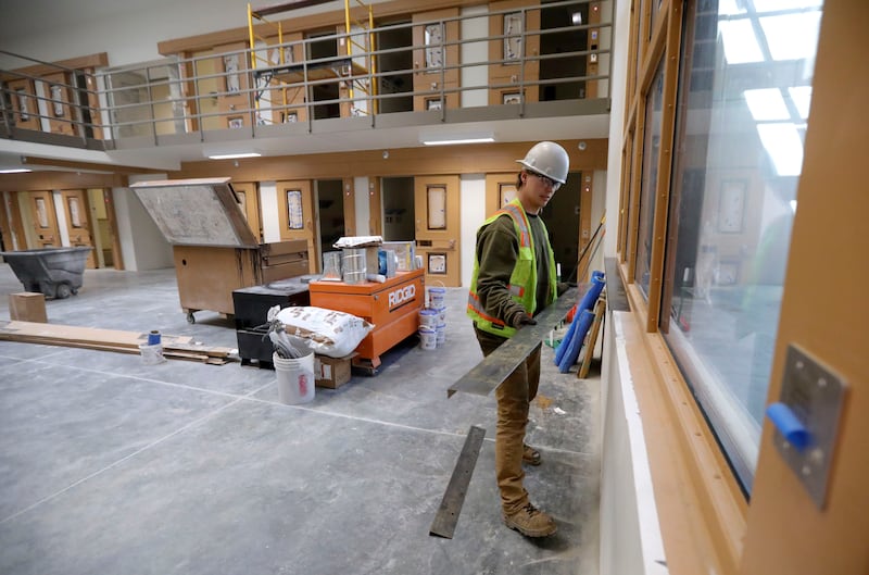 Dallas Tucker, Ezarc Building Solutions laborer, works in the receiving and orientation building at the new Utah State Prison in Salt Lake City.
