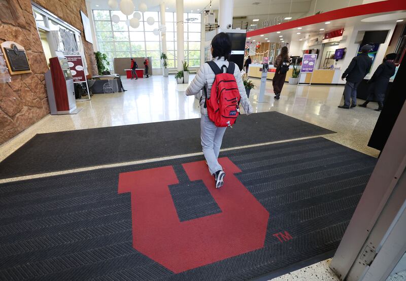 University of Utah students walk into the Union Building on campus in Salt Lake City.
