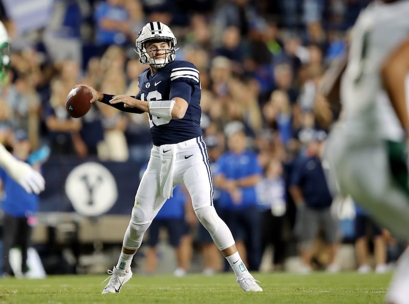BYU quarterback Baylor Romney looks to make a throw as BYU and South Florida play at LaVell Edwards Stadium in Provo.