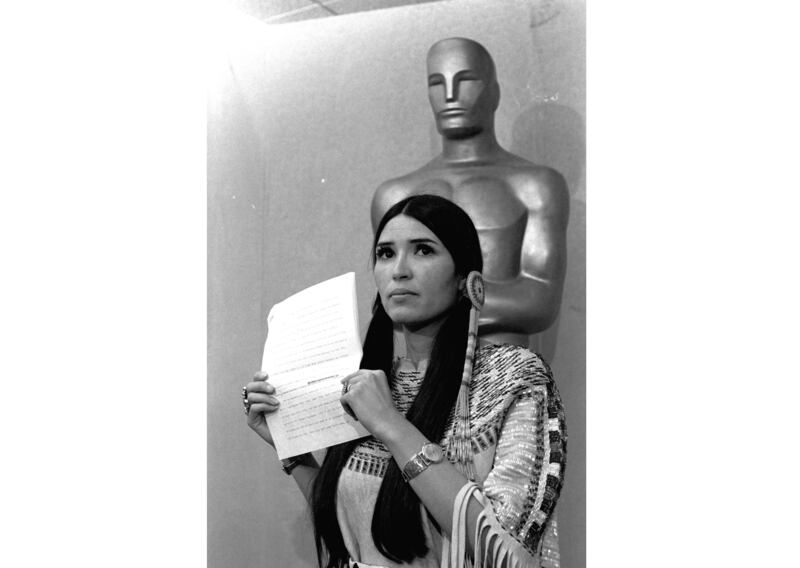 Sacheen Littlefeather appears at the Academy Awards ceremony to announce that Marlon Brando was declining his Oscar as best actor for his role in “The Godfather,” on March 27, 1973. Littlefeather died Sunday, Oct. 2, 2022, at age 75.