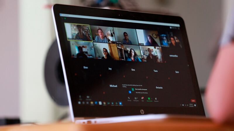 Students and instructors at the STEM Santa Fe engineering camp gather on a video call as seen through the laptop of instructor Esther Lescht in her home in Santa Fe, New Mexico.
