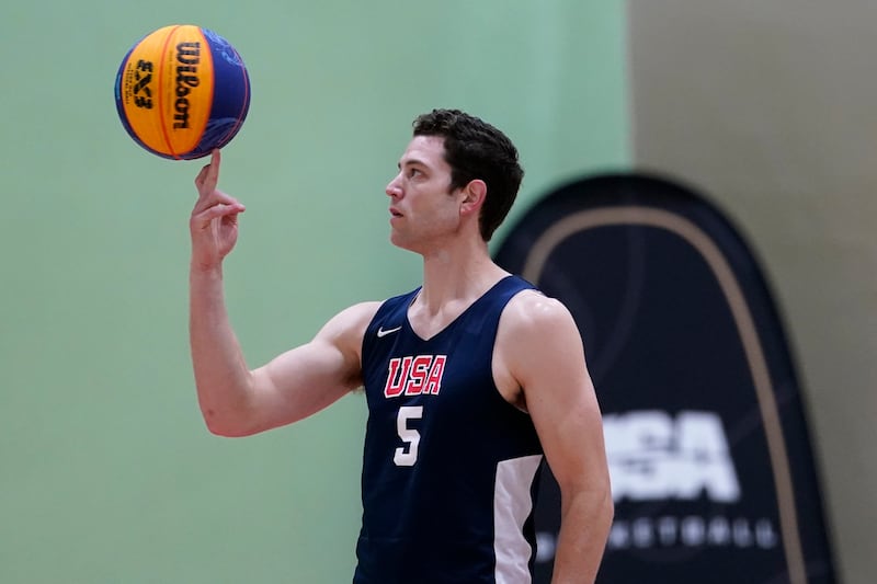 Jimmer Fredette spins the basketball during practice for the USA Basketball 3x3 national team on Oct. 31, 2022.