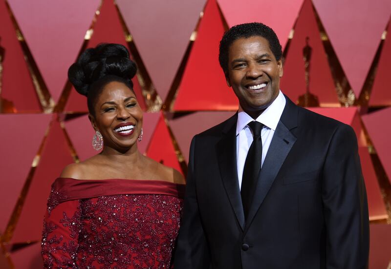 Pauletta Washington, left, and Denzel Washington arrive at the Oscars on Feb. 26, 2017, at the Dolby Theatre in Los Angeles.