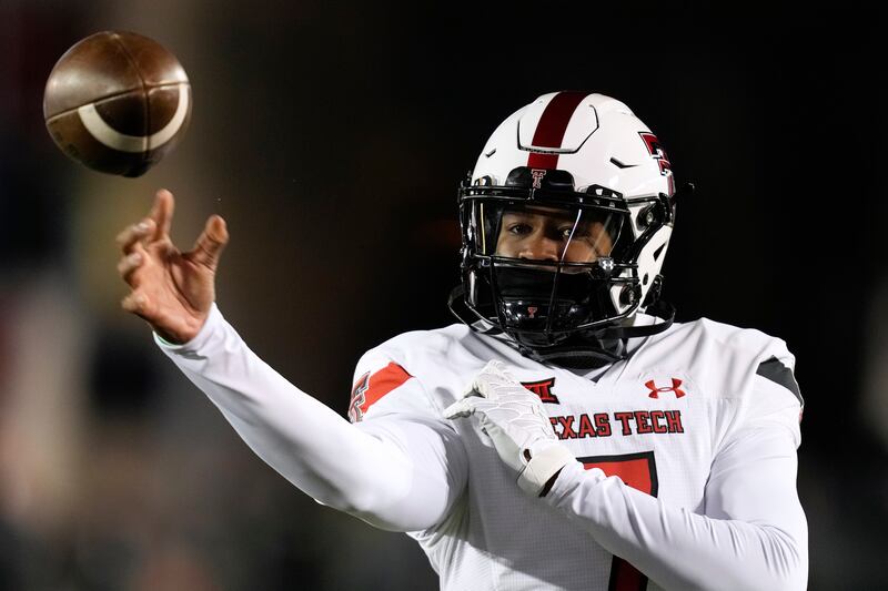 Texas Tech quarterback Donovan Smith warms up before a game Iowa State, Saturday, Nov. 19, 2022, in Ames, Iowa.