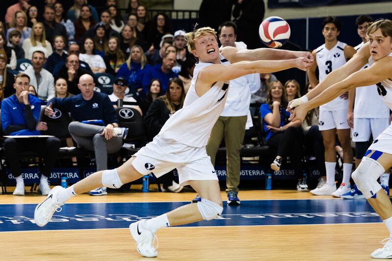 BYU’s Heath Hughes digs the ball during a volleyball match at the Smith Fieldhouse in Provo on Feb. 10, 2023.