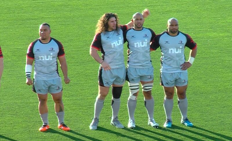 Utah Warriors co-captain Paul Lasike, far right, embraces his teammates before a match against the Toronto Wolfpack, Friday, April 20, 2018 at Zions Bank Stadium in Herriman.