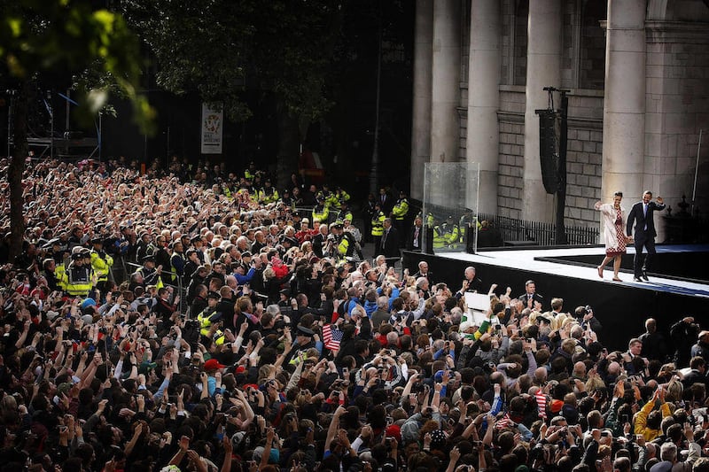 U.S. President Barack Obama and first lady Michelle Obama arrive in central Dublin to address thousands of people during their visit to Ireland, Monday, May 23, 2011. President Barack Obama opens a six-day European tour with a quick dash through Ireland,