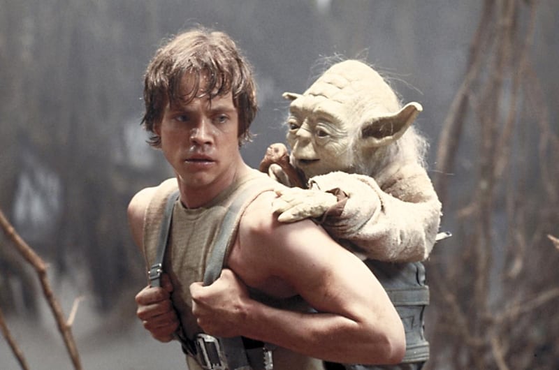 Mark Hamill as Luke Skywalker with Yoda in “Star Wars: Episode V — The Empire Strikes Back.”