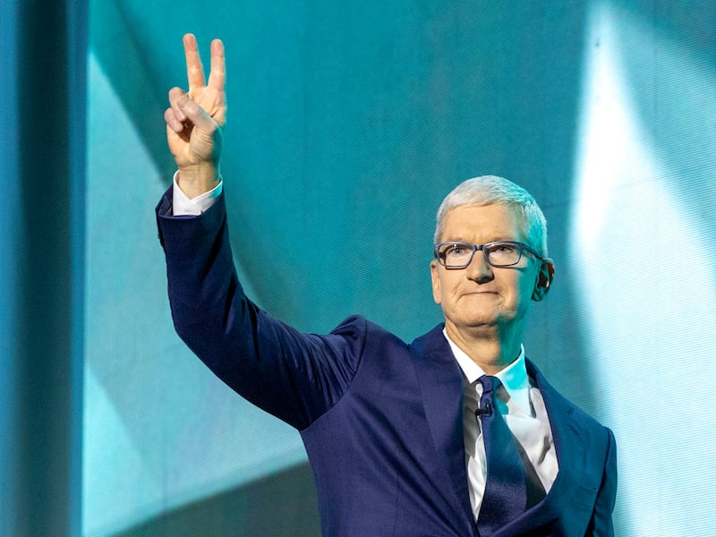Apple CEO Tim Cook acknowledges the crowd as during the Silicon Slopes Summit.