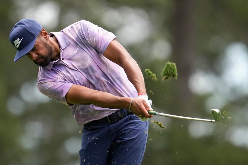Tony Finau hits his tee shot on the fourth hole during the first round at the Masters golf tournament at Augusta National Golf Club Thursday, April 11, 2024, in Augusta, Ga. (AP Photo/George Walker IV)