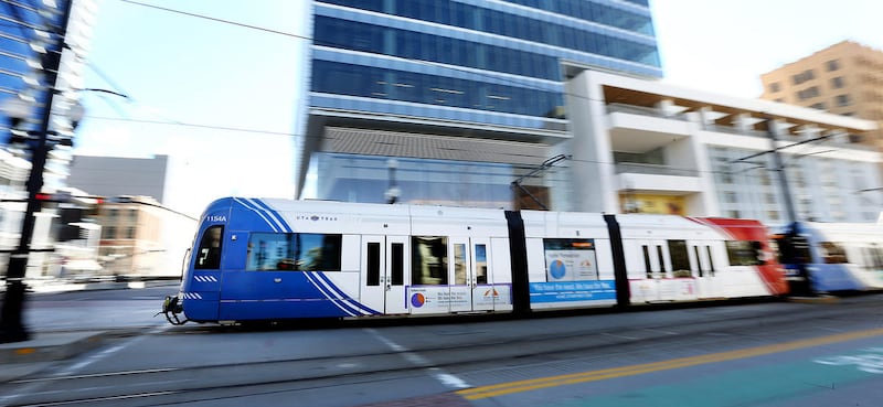 FILE - A TRAX train moves through Salt Lake City on Tuesday, April 4, 2017. The Utah Transit Authority is tweaking TRAX, bus and FrontRunner schedules for Monday’s Pioneer Day festivities.