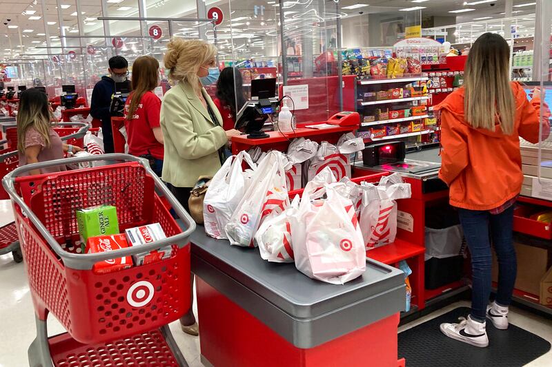 A customer wears a mask in Target.