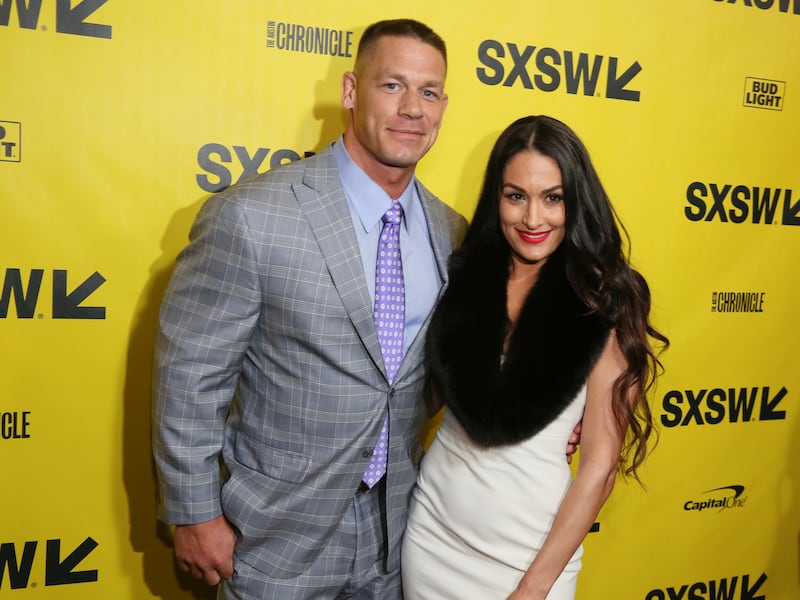 John Cena and his fiancé, Nikki Bella, arrive for the world premiere of "Blockers" during the South by Southwest Film Festival at the Paramount Theatre on Saturday, March 10, 2018, in Austin, Texas. (Photo by Jack Plunkett/Invision/AP)