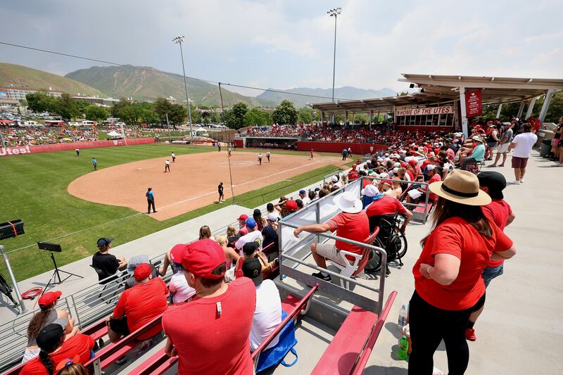 Fans watch as the University of Utah softball team plays Ole Miss in NCAA softball regional championship.