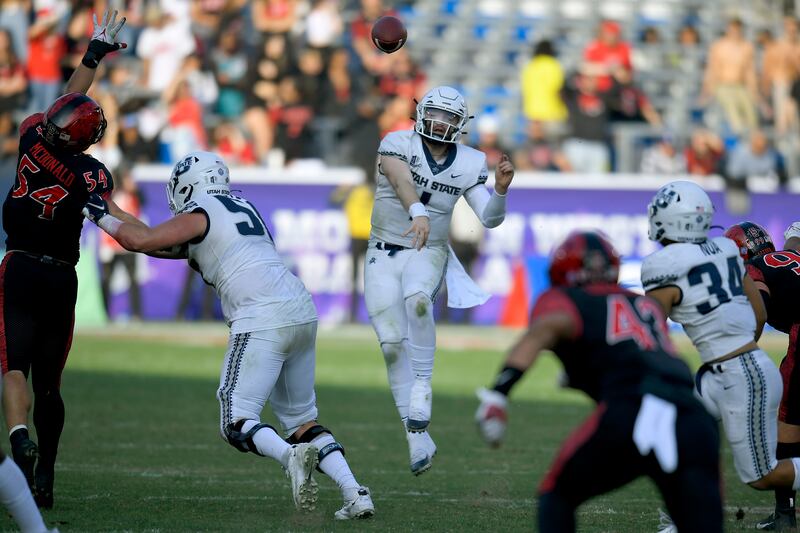 Utah State quarterback Logan Bonner passes against San Diego State on Saturday, Dec. 4, 2021, in Carson, Calif.