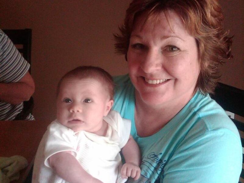 Dayna Nichols proudly holds her 11-month-old granddaughter, something she considers a miracle. Nichols has dealt with cancer and losing one of her legs.