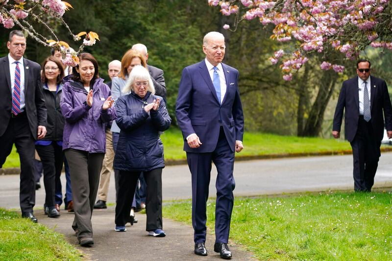 President Joe Biden arrives with Sen. Patty Murray, and Sen. Maria Cantwell to speak at Seward Park on Earth Day.