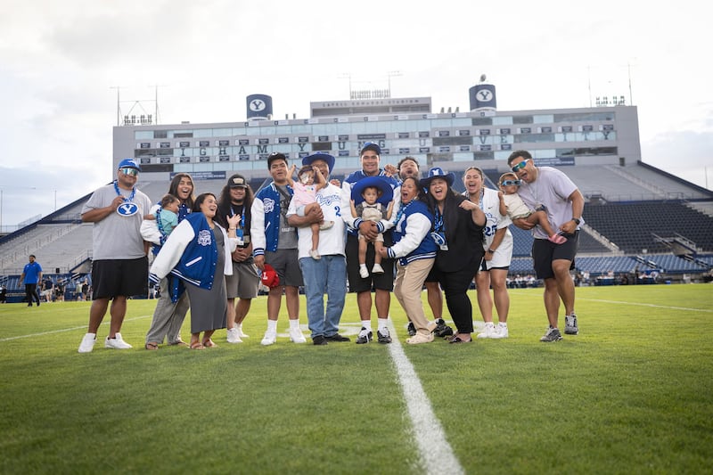 New BYU commit Uhila Wolfgramm poses for a picture with family members during visit to BYU in Provo, Utah.
