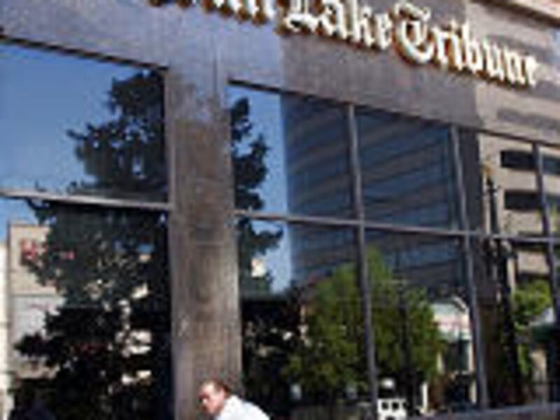 Louis Sattler of Bailey's Moving \\\\& Storage moves contents of The Salt Lake Tribune on Friday. The Tribune is moving from Main Street to The Gateway.