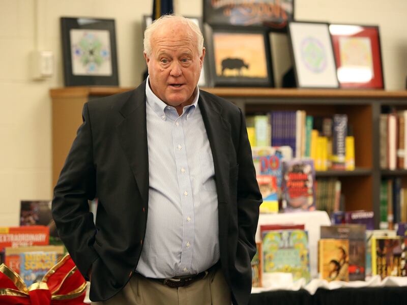 FILE: Ron McBride speaks at the ribbon cutting ceremony for the newly remodeled library at Bryant Middle School in Salt Lake City on Thursday, Oct. 27, 2016. McBride and his foundation have joined the fight against opiod addiction.