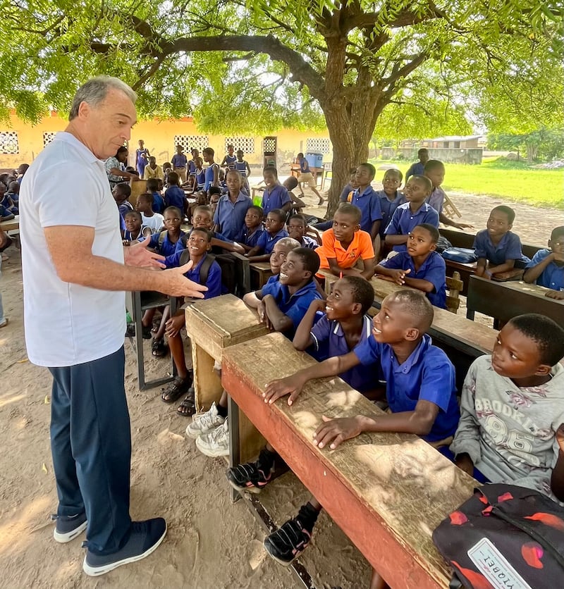 Latter-day Saint senior missionaries serving under the Geneva Office for Human Rights Education present a lesson on human rights to children in Ghana.