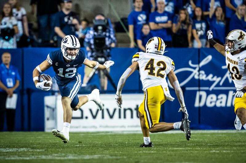 BYU wide receiver Puka Nacua runs with the ball against Wyoming on Saturday, Sept. 24, 2022.