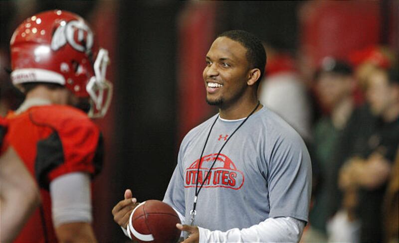 New University of Utah quarterbacks coach Brian Johnson smiles during the opening day of spring football practice.