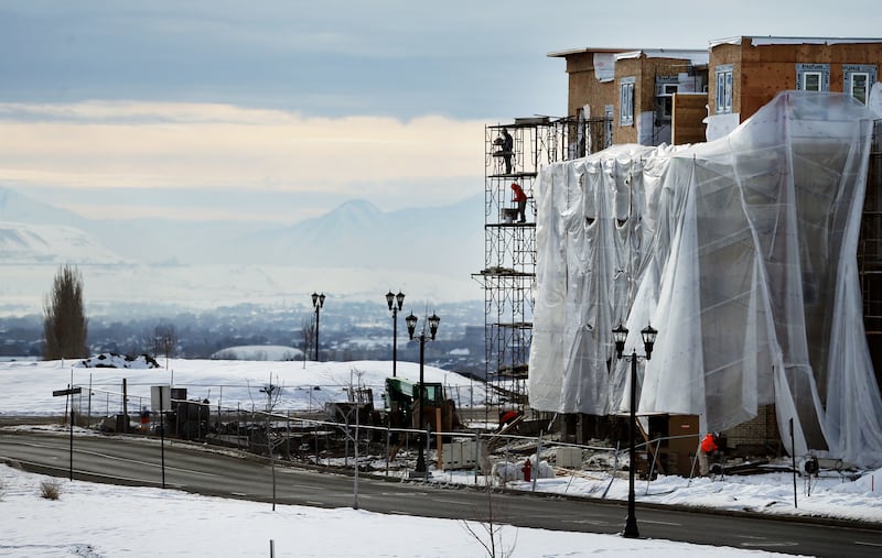 FILE - Construction on condominiums continues in Daybreak on Friday, Feb. 3, 2017.
